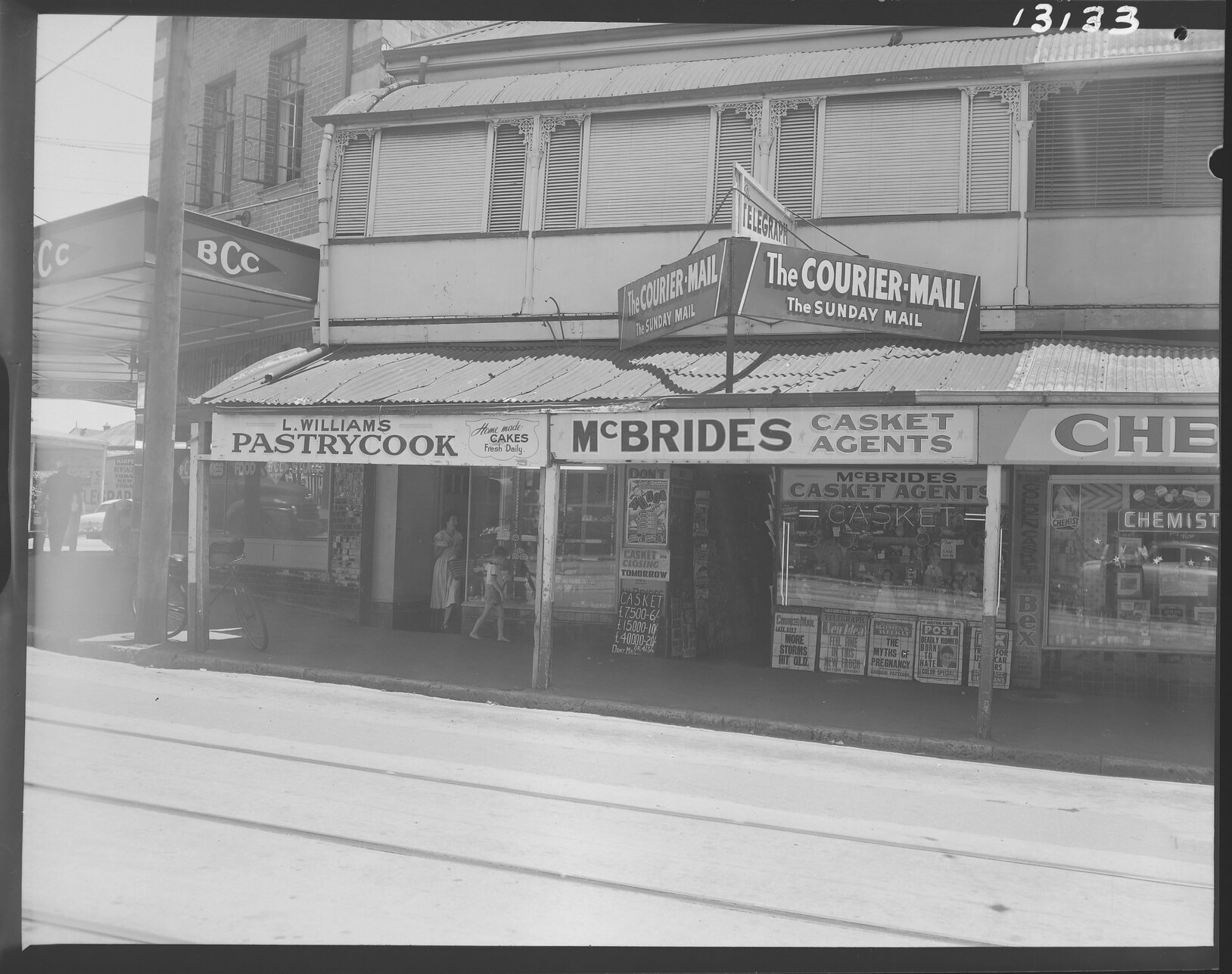 199 Boundary Street, near corner of Vulture Street with baker, chemist and newsagent - 1959
