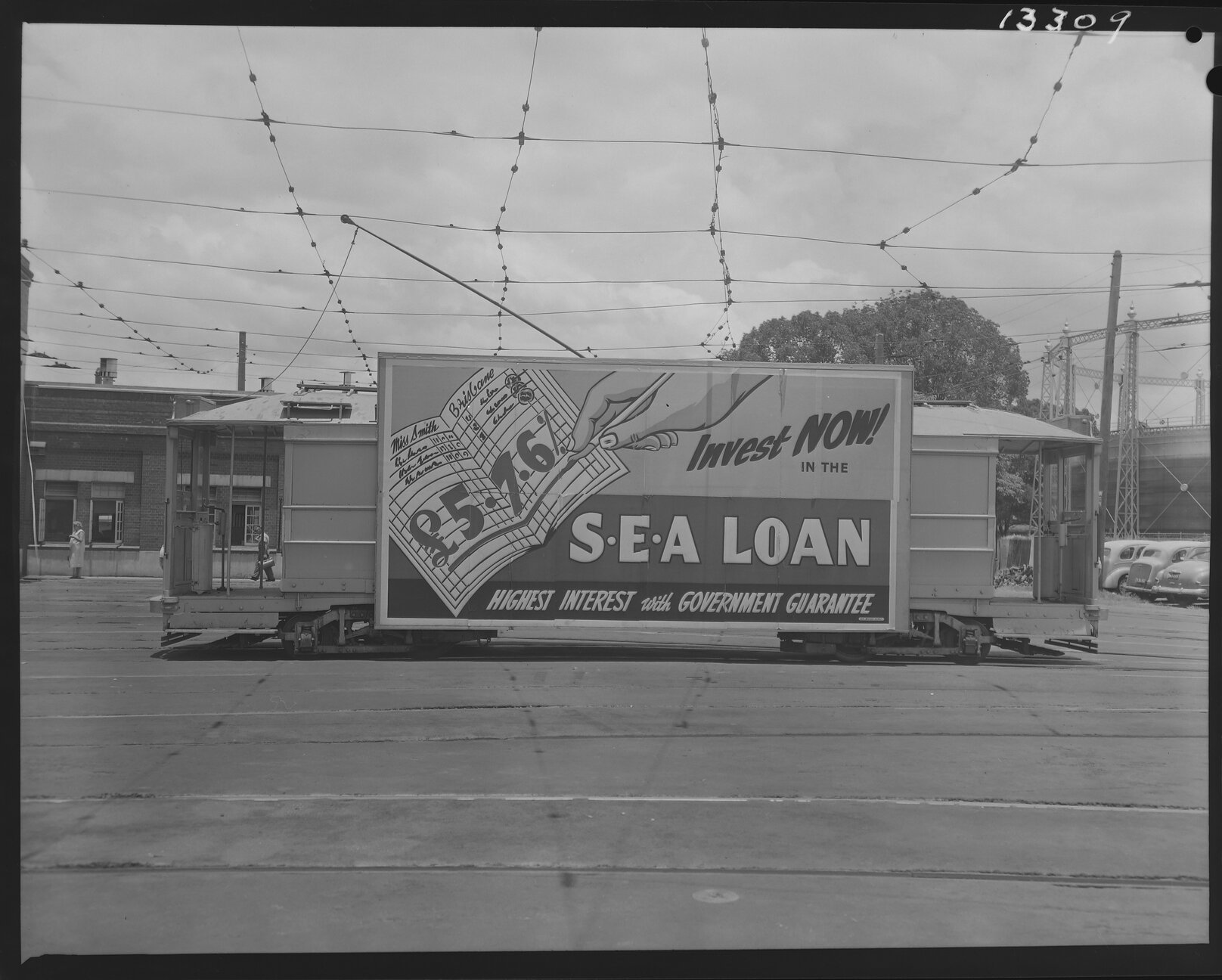 Tram advertising SEA Loans - 1959