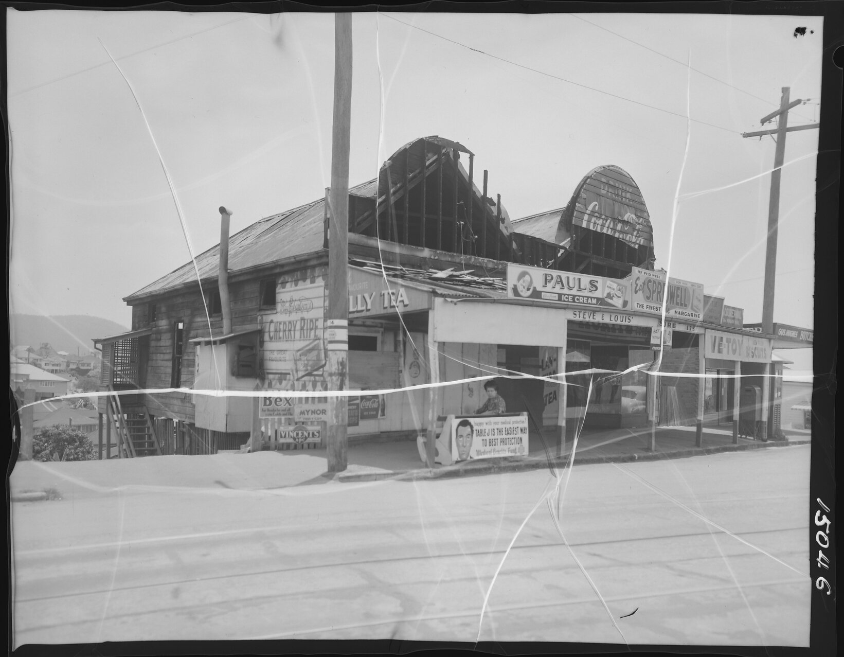 Burnt out shop on Latrobe Terrace, corner of Prince Street, Paddington - 1960