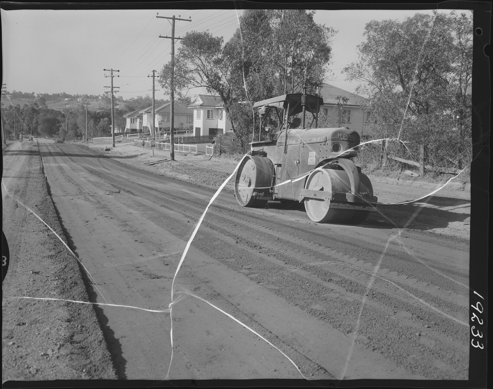 Steamroller flattening Dawson Parade in preparation for construction, Grovely, Keperra - 1962
