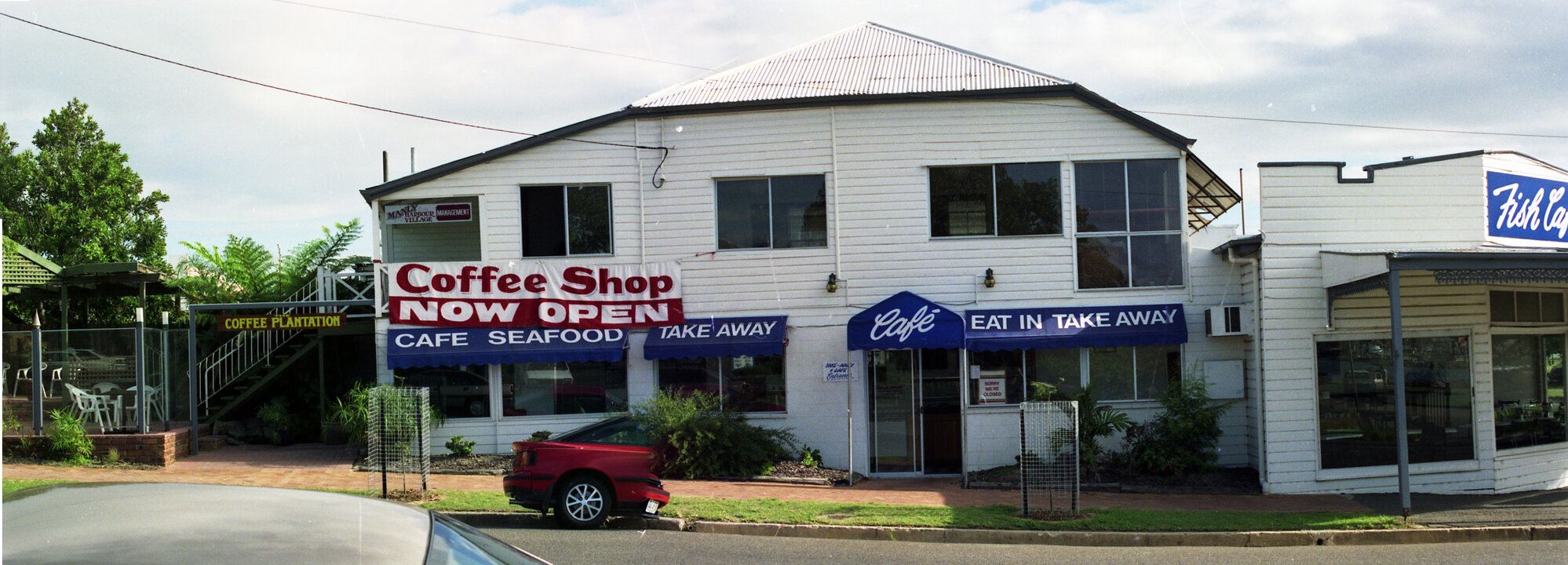 Shopping strip along Cambridge Parade, Manly - 1991