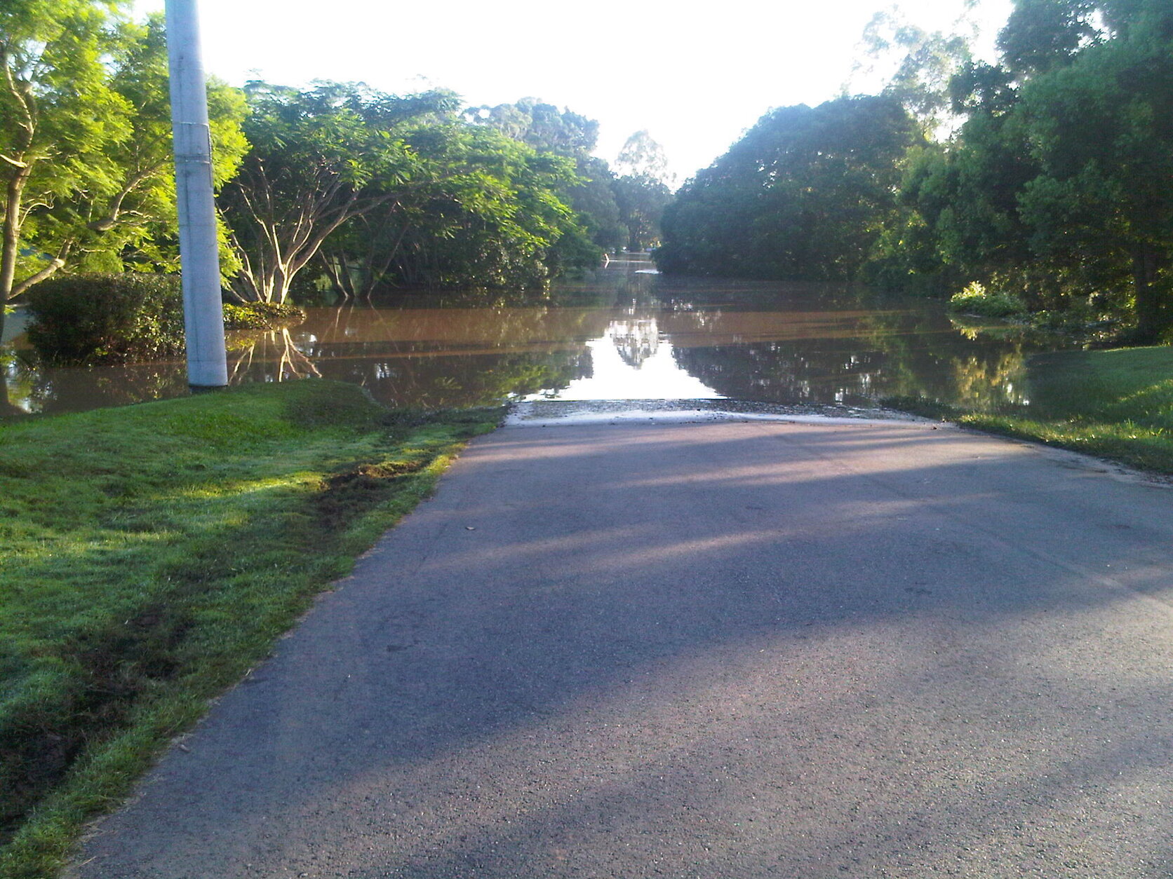 Jesmond Road near Cubberla Street from Needham Road under floodwater, Fig Tree Pocket - 2011
