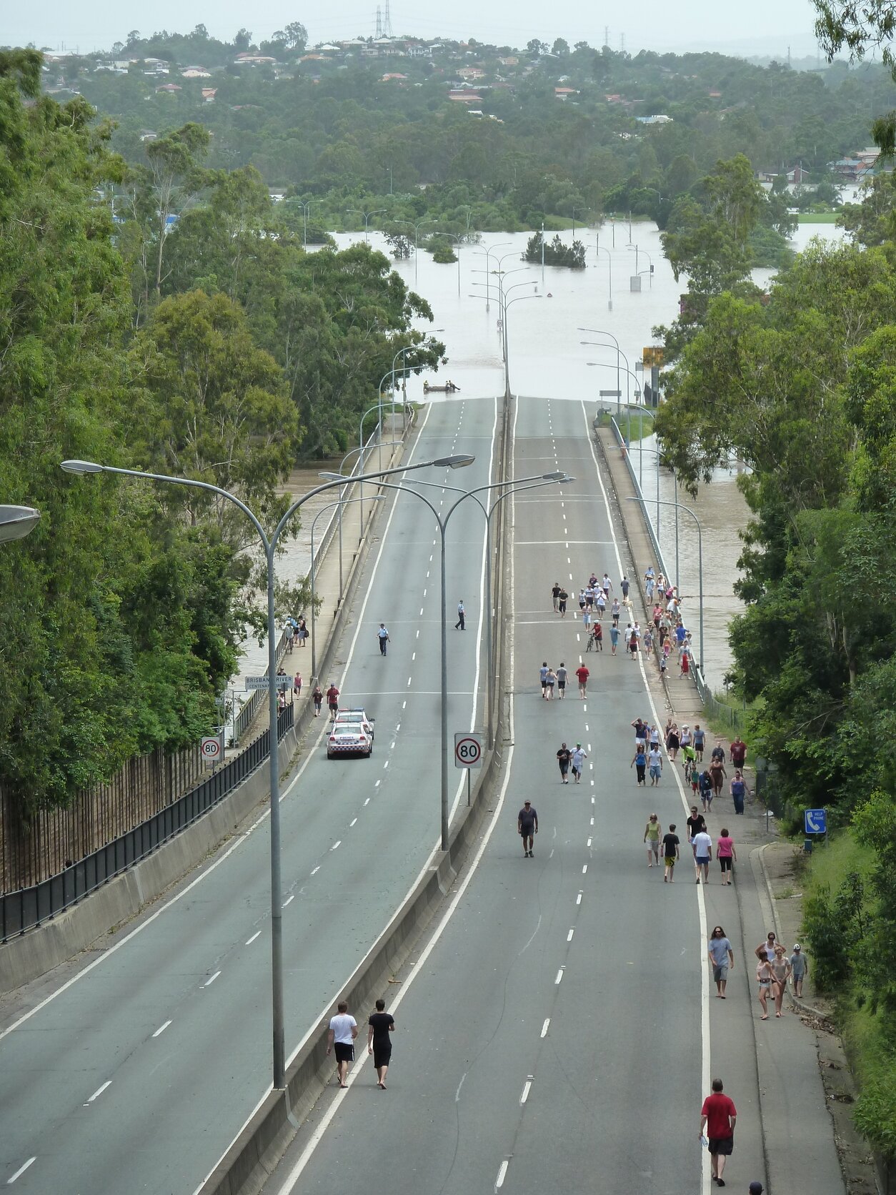 Shot of Centenary Bridge plunging into floodwaters on the north bank of Kenmore and Fig Tree Pocket - 2011