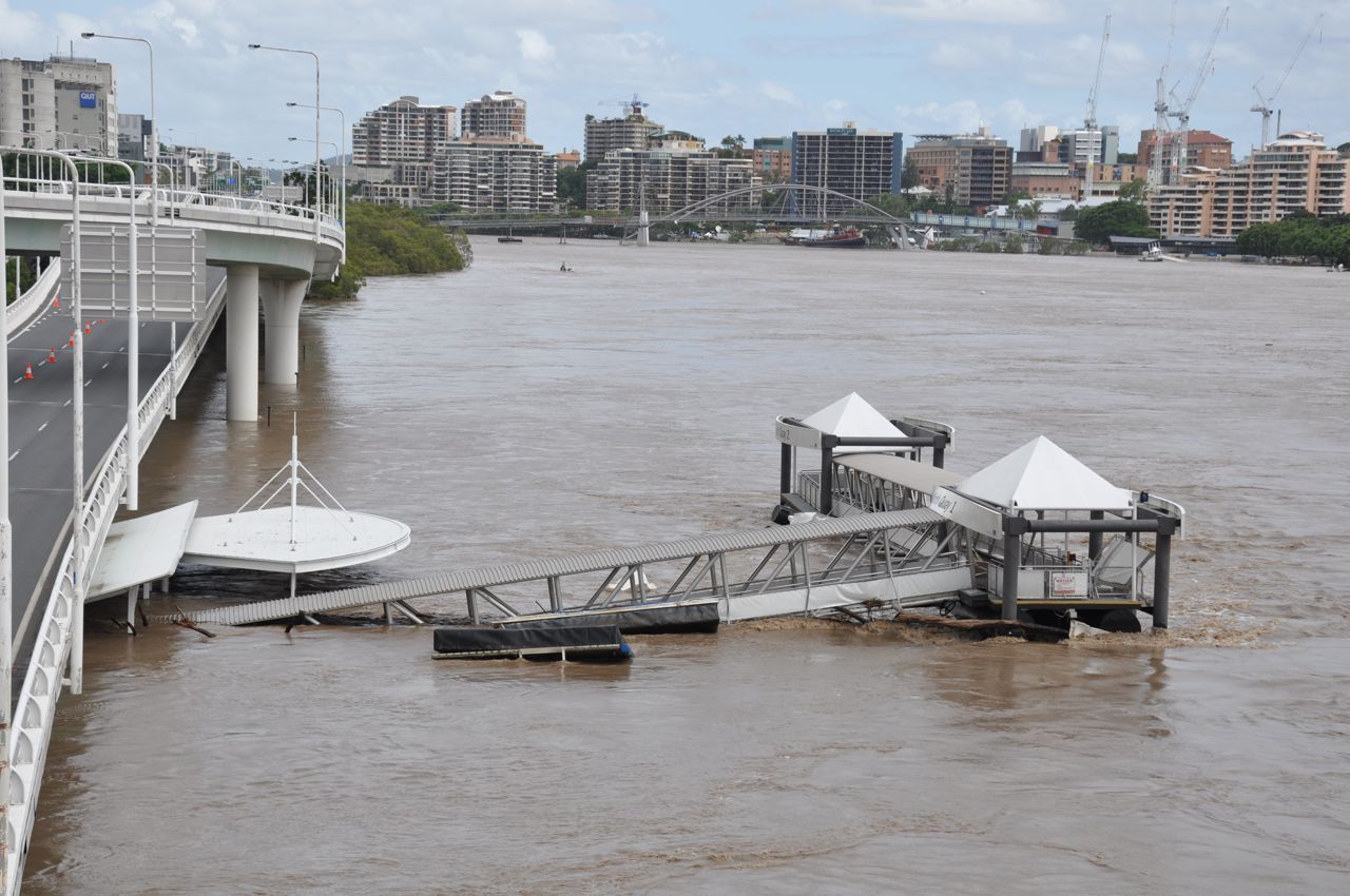 North Quay ferry terminal peeking above the flooding river looking towards South Brisbane - 2011
