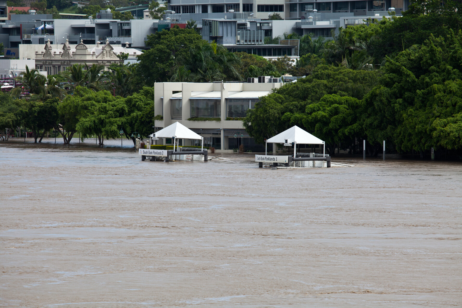 South Bank Parklands ferry terminals floating above heavy floodwaters, South Brisbane - 2011