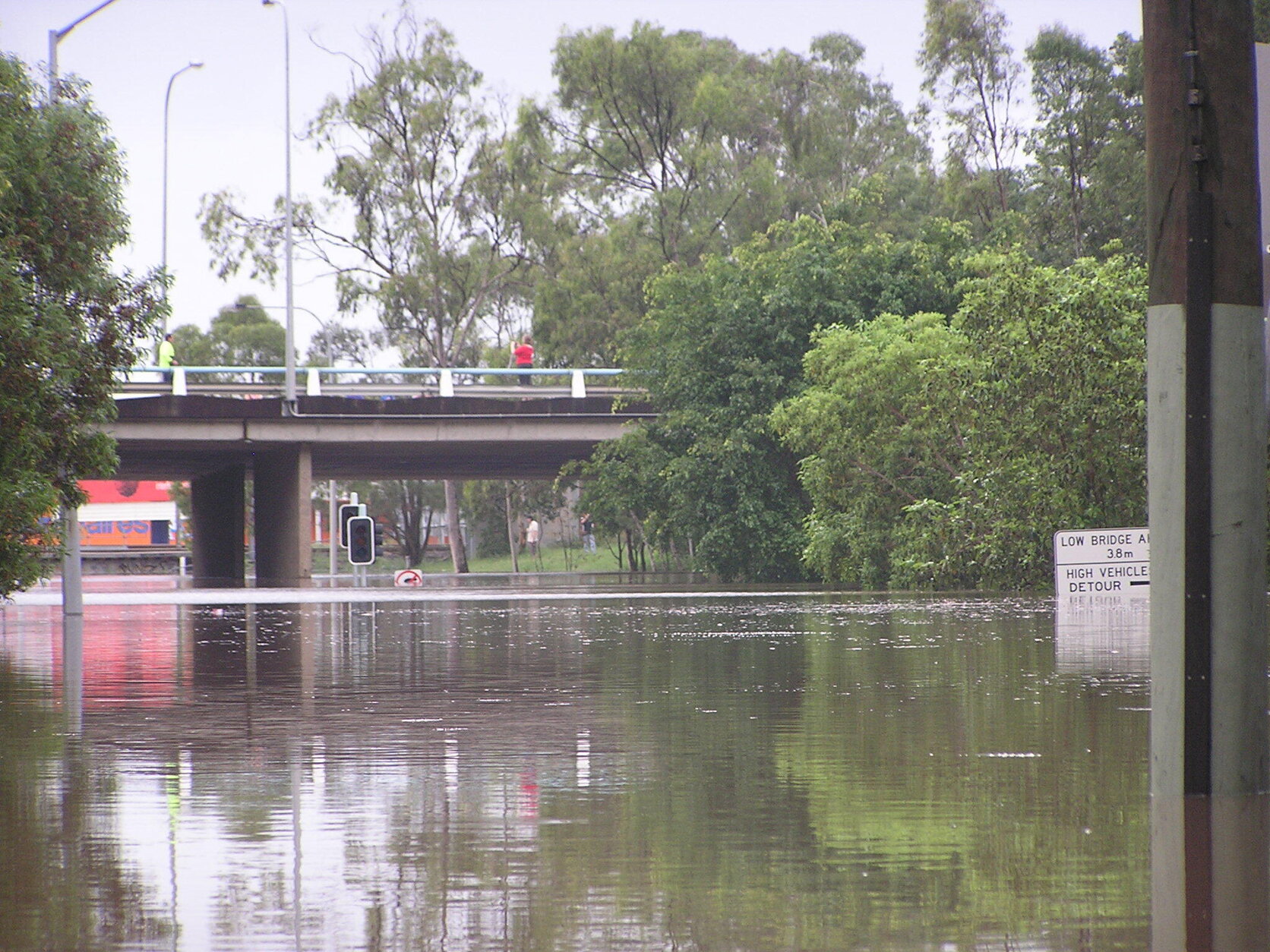 Section of Muriel Avenue under Ipswich Road overpass completely submerged by floodwaters, Moorooka - 2011