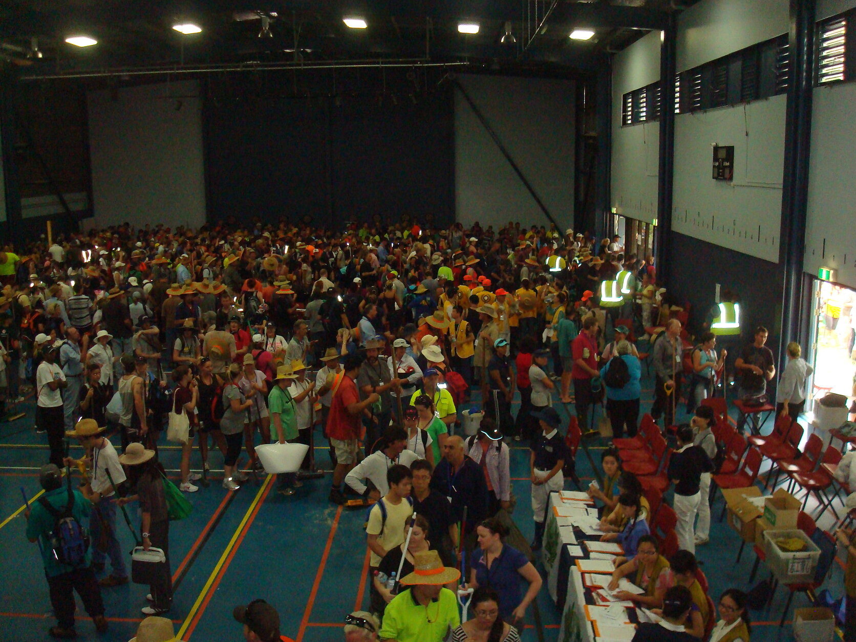 Mud Army volunteers registering and collecting equipment from Macgregor State High School - 2011