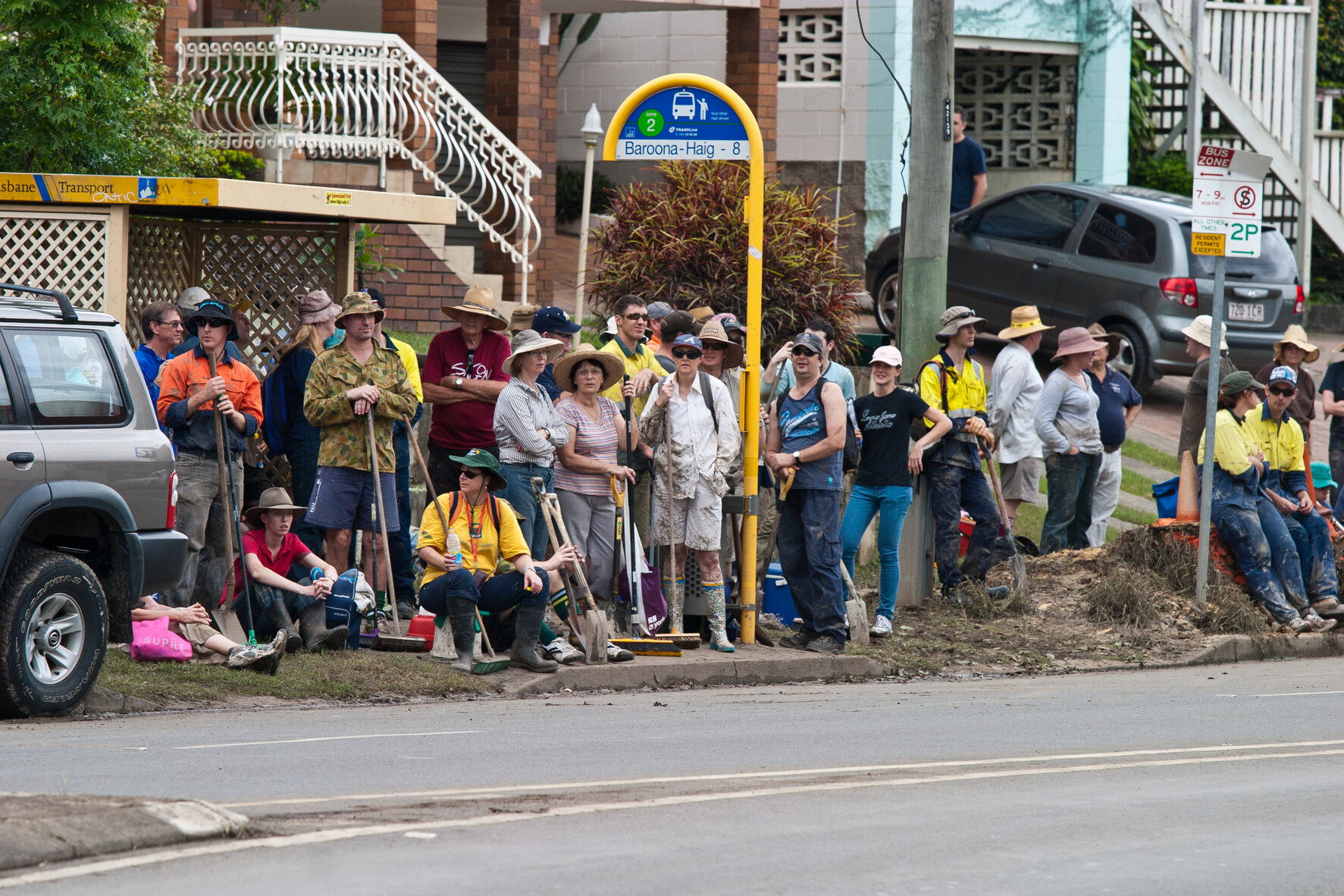 Mud Army volunteers waiting for bus on Baroona Road, Milton - 2011