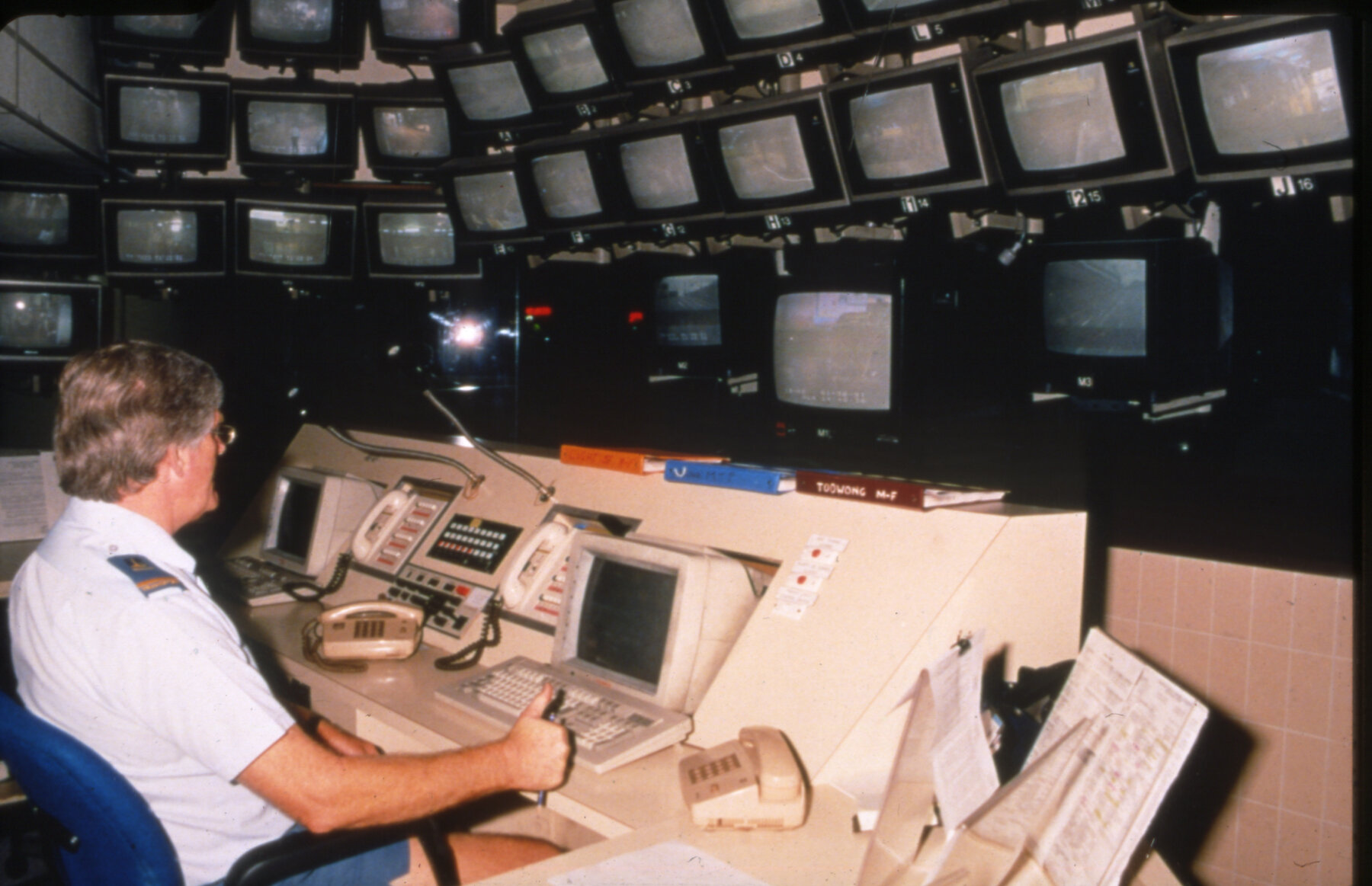 Council worker at bus control station - 1988