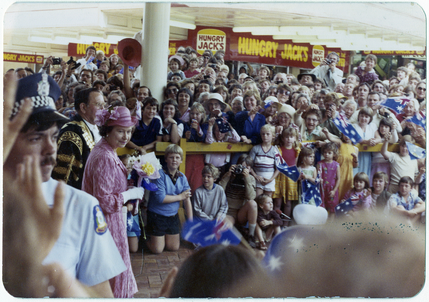 Queen Elizabeth II and Lord Mayor Roy Harvey outside Queen Street Hungry Jacks - 1982