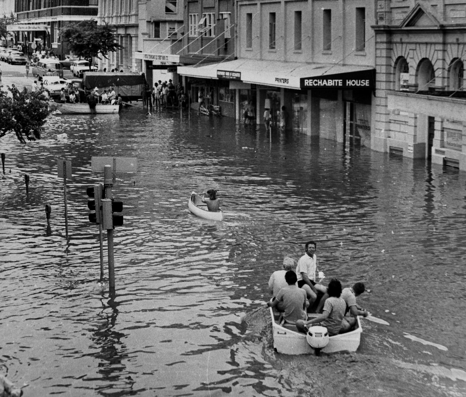 Boating down Edward Street in 1974 Flood