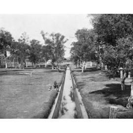Children playing near storm drain, Milton - 1915