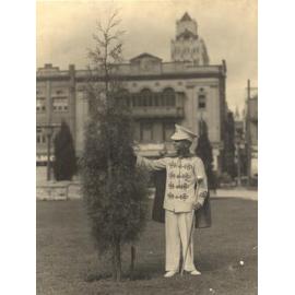 Charlie Stanton standing beside Tree he planted in Anzac Square - 1931