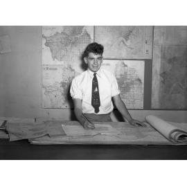 Town Planning Section City Hall - Staff using 4 Chain Maps 1950