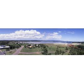 Panorama view of North Pine Dam - excess water being released from spillway due to being full for first time since completion