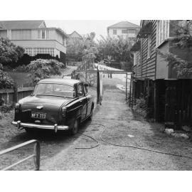 Black and White Taxi in Yard - Highgate Hill - 1959
