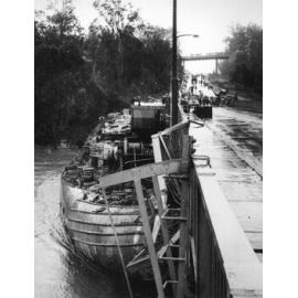 Ship into the side of Centenary Bridge - 1974 Flood