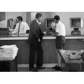 Brisbane City Council Staff reading Microfilm Cards - 1970