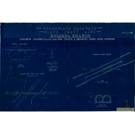 Queensland Railways north coast line, Bulimba branch, concrete culvert, pipe trestle and Breakfast Creek Road crossing