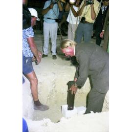 Lord Mayor Clem Jones placing time capsule in Brisbane Administration Centre construction site - 1974