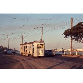 Tram No. 401 on Kingsford Smith Drive at sunset, Hamilton - 1968