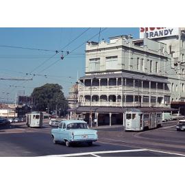 Trams No. 440 and No. 509 outside National Hotel and Customs House at corner of Adelaide Street and Queen Street - 1968