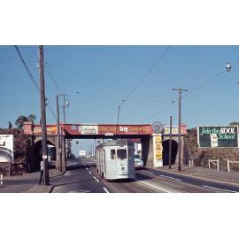 Tram No. 495 on Lutwyche Road, Windsor, under the railway bridge - 1968