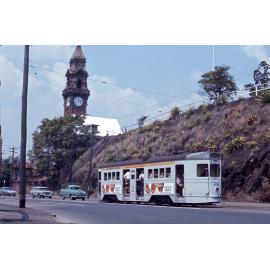 Tram No. 438 on Stanley Street with view of South Brisbane Town Hall clock tower - 1968