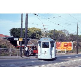 Trams No. 99 and No. 65 on Milton Road turning into side road - 1968
