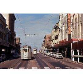 Trams No. 531 and No. 447 passing in Queen Street, Brisbane City - 1969