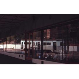 Reflection of tram No. 551 in music shop window - Stanley Street, Woolloongabba - 1969