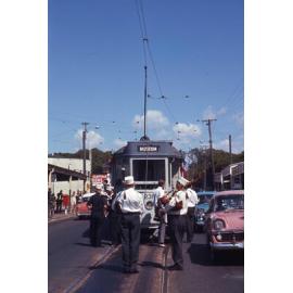 Tram No. 231 on Sandgate Road, Clayfield accompanied by bagpipers - 1969