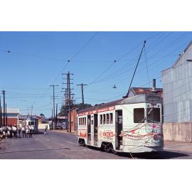 Tram No. 412 painted with flowers and covered with ribbons, No. 531 in background on Trafalgar Street, Woolloongabba - 1969