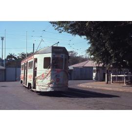 Tram No. 412 painted with flowers and covered with ribbons rounding the corner with No. 531 on Amy Street and Agnes Street, Albion - 1969