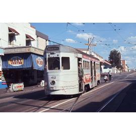 Tram No. 412 with ribbons on Boundary Road near Vulture Street, West End - 1969