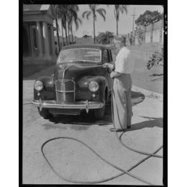 Man washing car - 1952