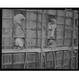 Workmen pouring concrete in Serviceton Reservoir, Spring Hill - 1953