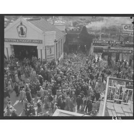 Crowds at railway station at Exhibition (Ekka) grounds - 1950