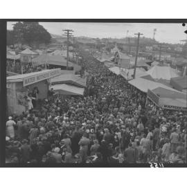 Crowds at stalls in Exhibition (Ekka) grounds - 1950