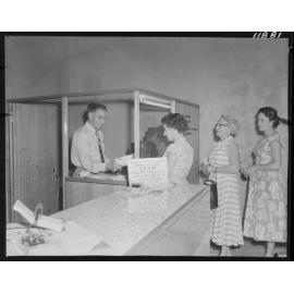 Women lining up at Administration Centre, Wynnum - 1959