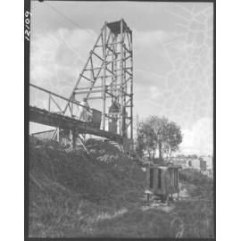 Poppet head and minecart excavating material for north Kedron Brook sewer line - 1959
