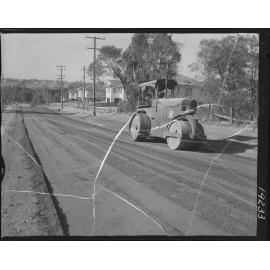 Steamroller flattening Dawson Parade in preparation for construction, Grovely, Keperra - 1962