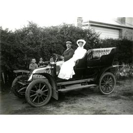 Couple Going For a Drive In Their New Car - c1910