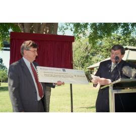 Lord Mayor Jim Soorley Presenting Final Payment on Story Bridge Loan to State Government Minister in Captain Bourke Park - Kangaroo Point.